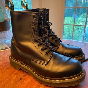 Like new Dr. Martens 1460 black leather boots. Smoke free home. Size 7.